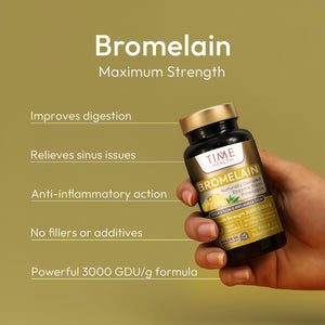 Bottle of Time Health Bromelain supplement held by a hand with product details on a green background | Hover