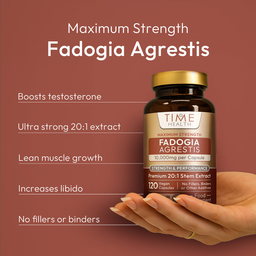 Bottle of Time Health Fadogia Agrestis supplement held by a hand on a brown background | Hover