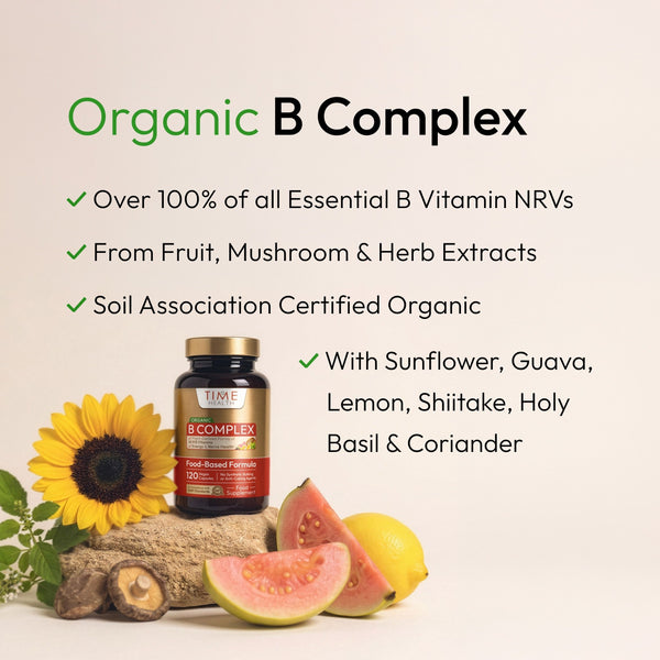 Organic B Complex supplement bottle displayed with a sunflower, guava slices, lemon, and herbs on a light beige background with descriptive text. Hover
