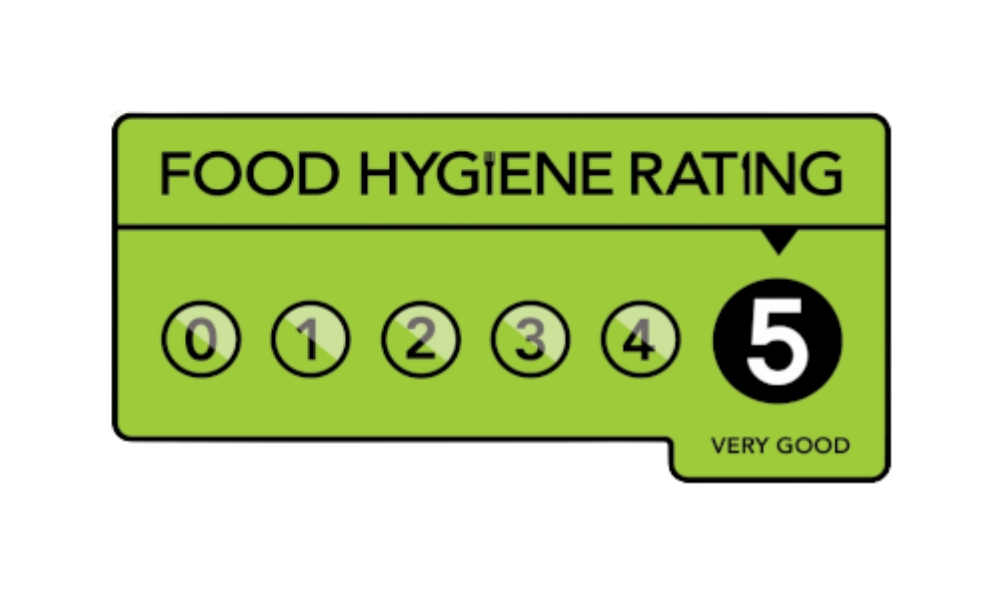 Food hygiene rating sign with a score of 5 on a green background